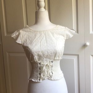 Cream babydoll style blouse.